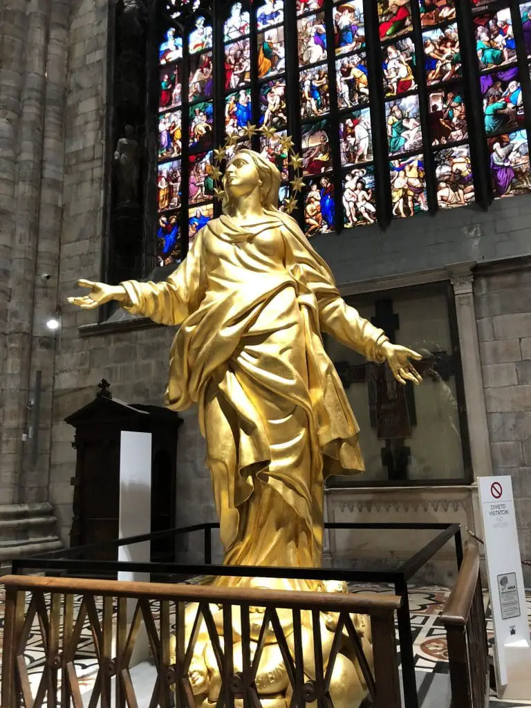 Gold statue in Milan, Italy